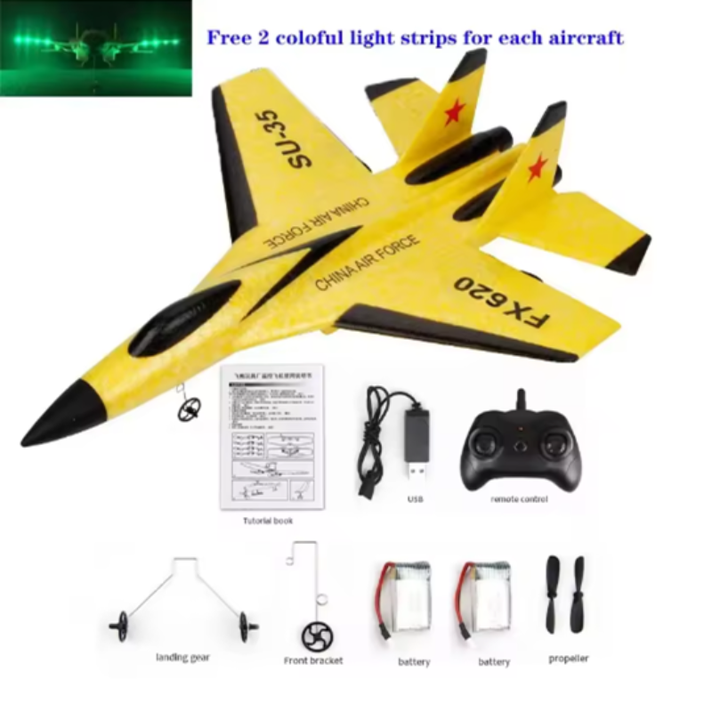 Yellow toy airplane with black accents, remote control, and accessories on a white background.