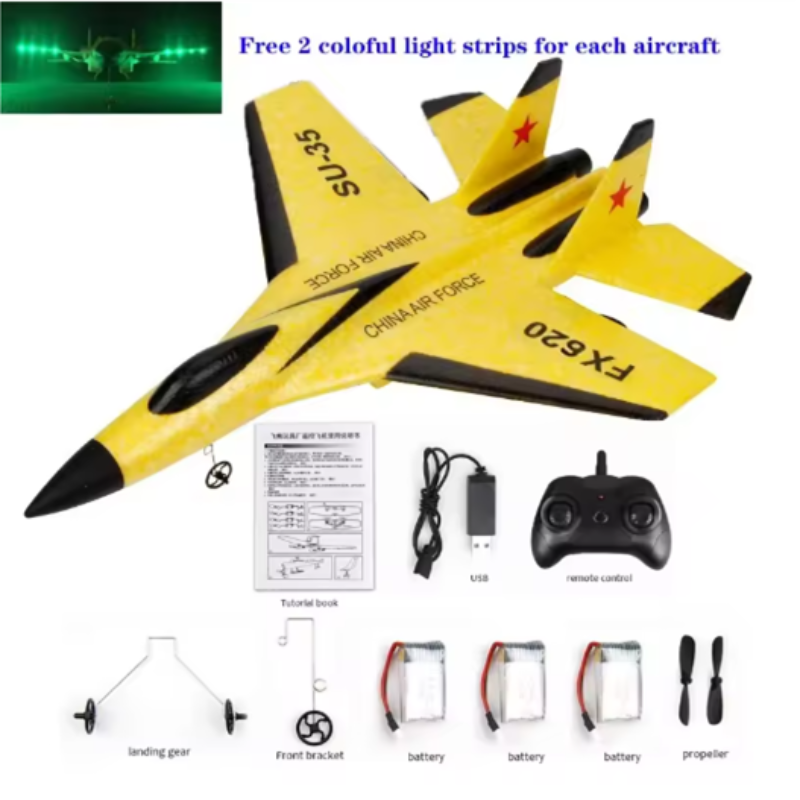 Yellow toy airplane with remote control, batteries, and propeller on a white background