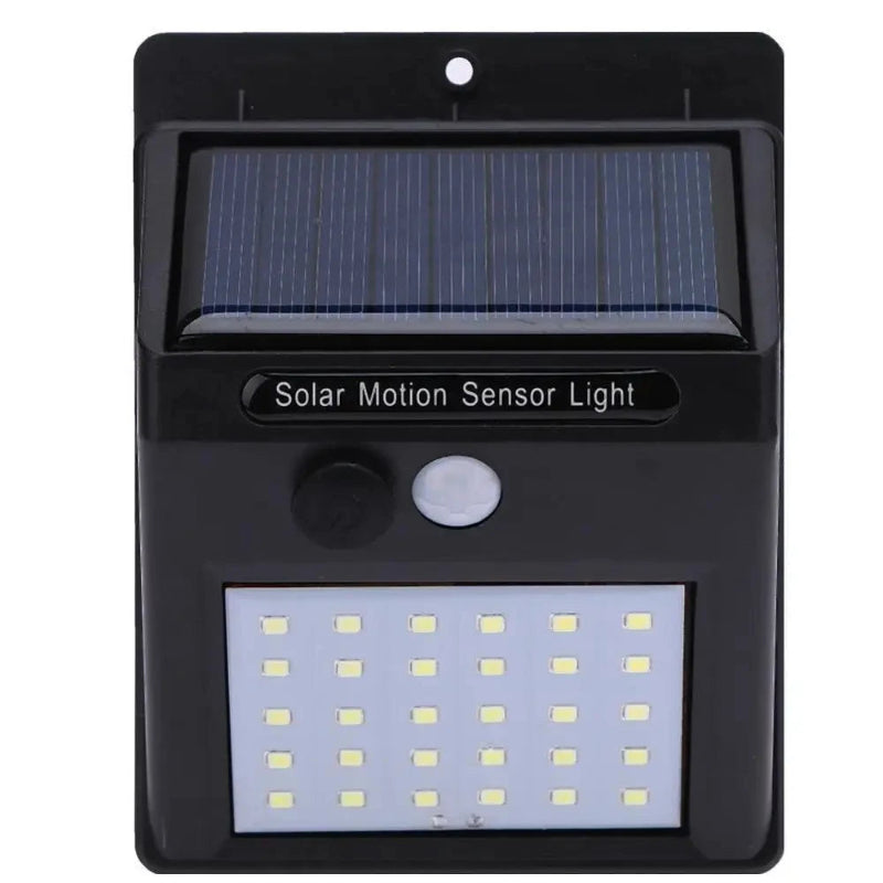 Solar motion sensor light with solar panel and LED lights on a white background
