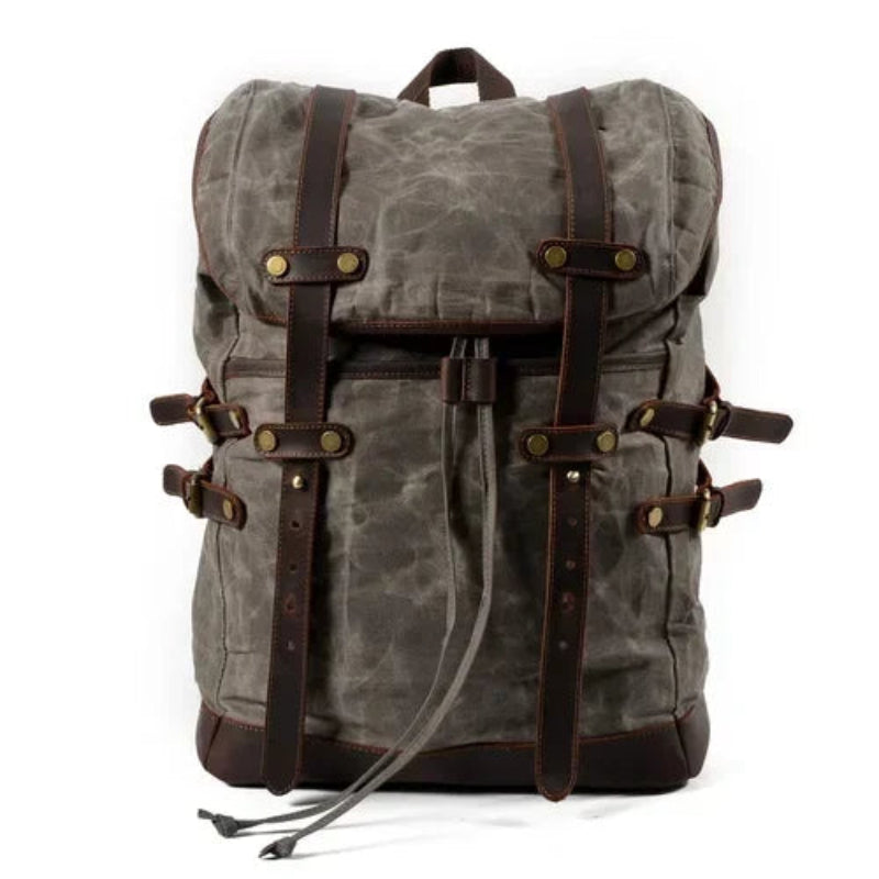 Gray backpack with brown straps and accents on a white background