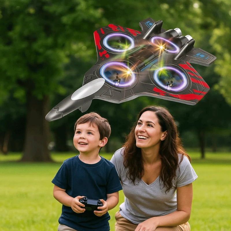 Woman and child playing with a toy drone in a park