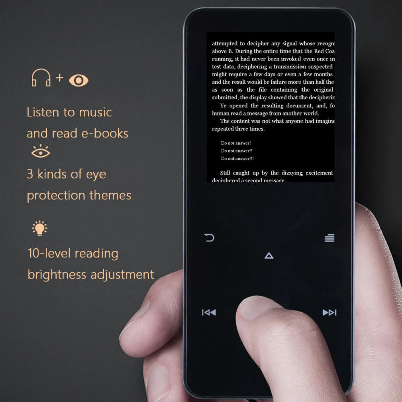 Hand holding a black e-reader with text displayed, against a dark background.