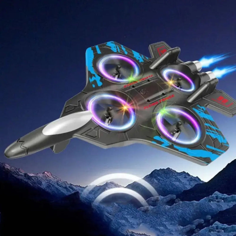 Toy drone with colorful lights flying over a mountainous landscape