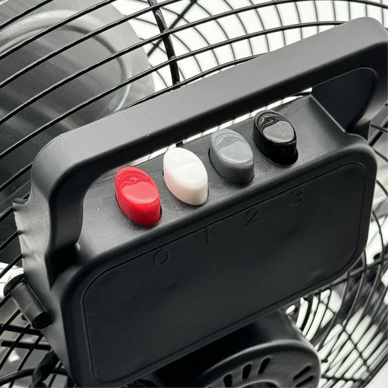 Control panel with red, white, and black buttons on a fan