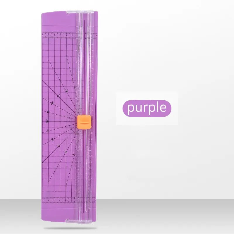 Purple paper cutter with grid on a white background