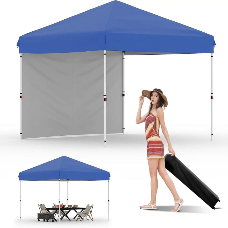 Blue pop-up canopy tent with gray side panel, woman with suitcase on white background