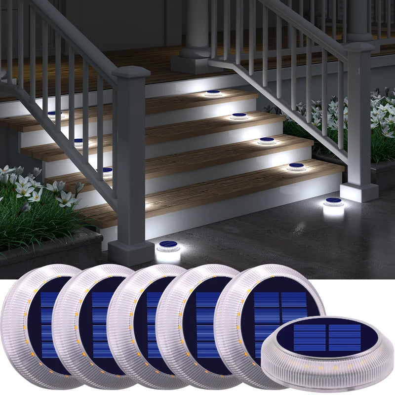 Solar-powered outdoor lights illuminating a staircase on a dark night.