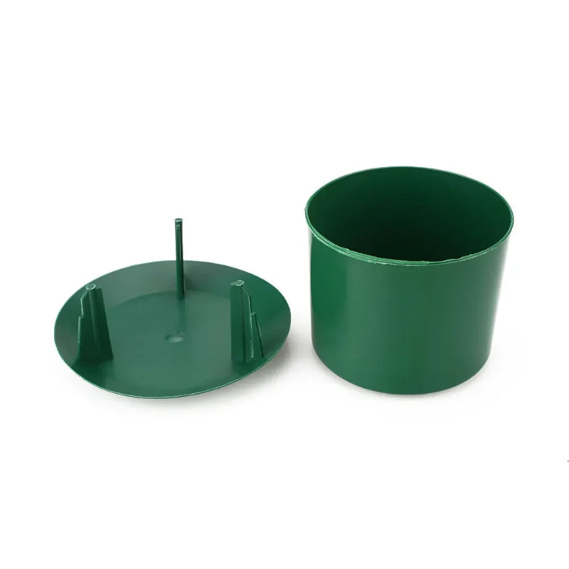 Two green metal containers on a white background
