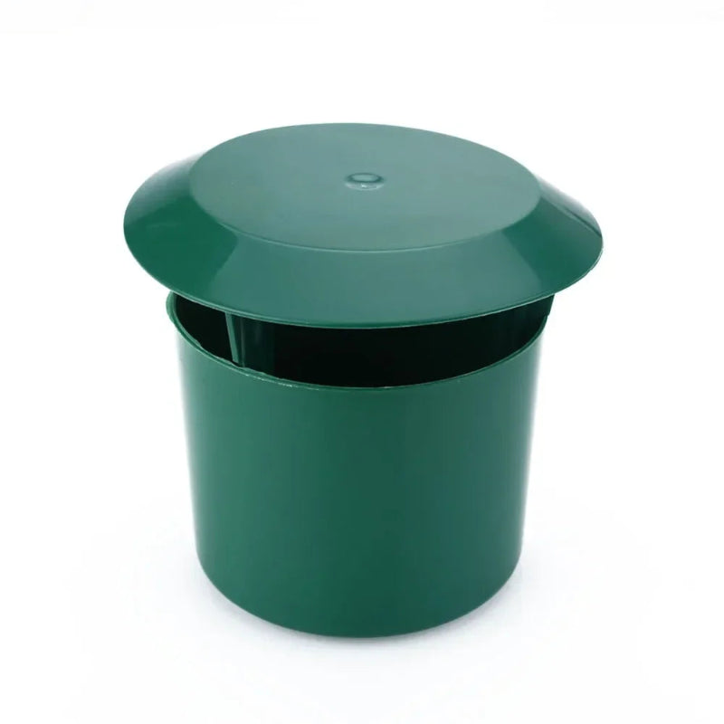 Green plastic container with a lid on a white background
