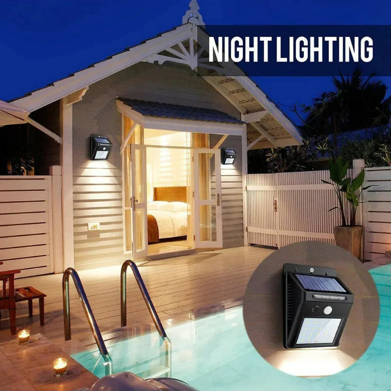 Outdoor pool area with night lighting system and solar light fixture.