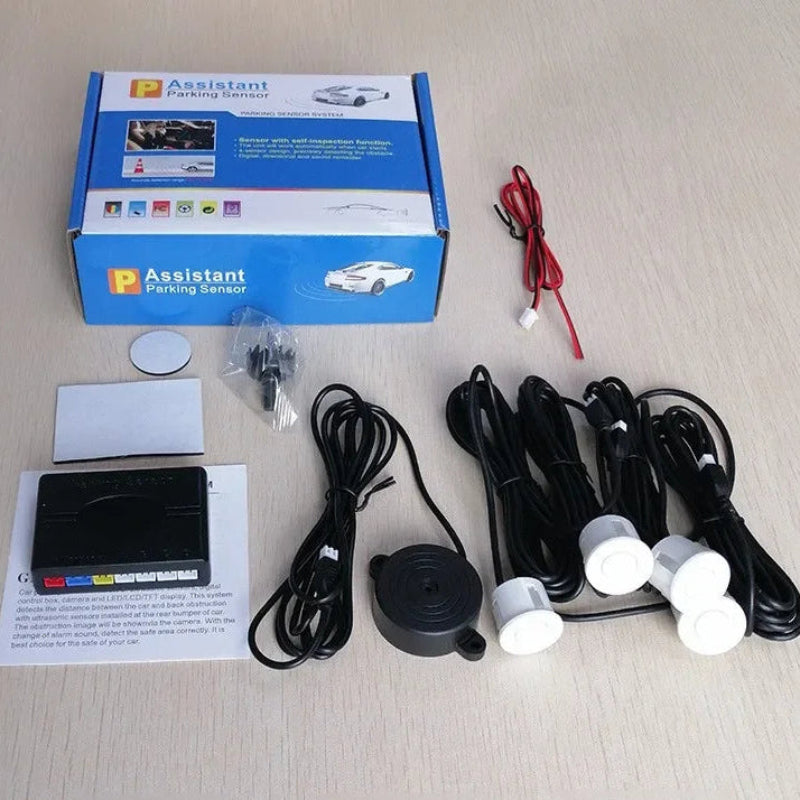 Assistant brand parking sensor kit with components on a light surface