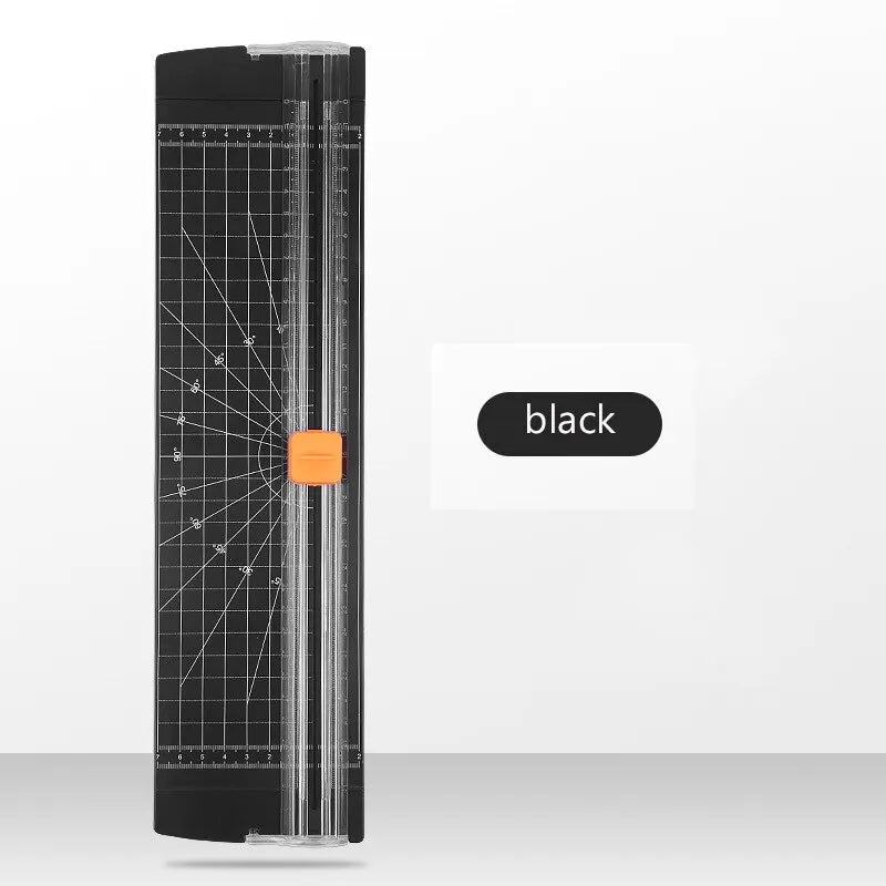 Black paper cutter with grid on a white background