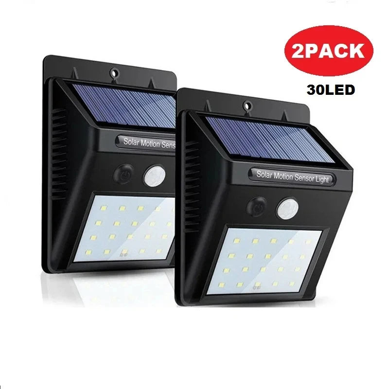 Two solar motion sensor lights with 30 LEDs on a white background, labeled as a 2-pack.