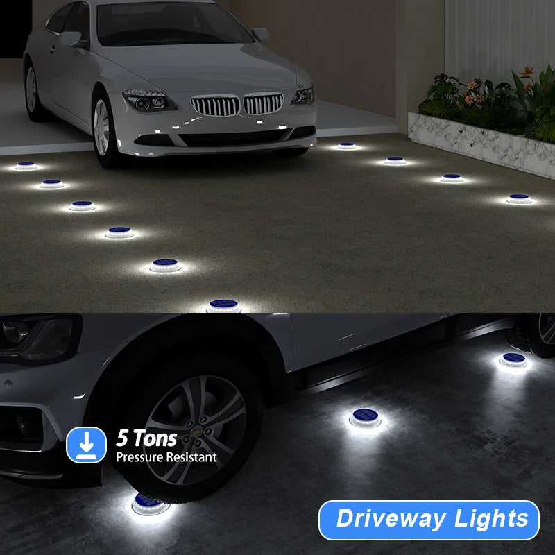 Driveway lights illuminating a driveway with a car parked nearby, emphasizing their durability.