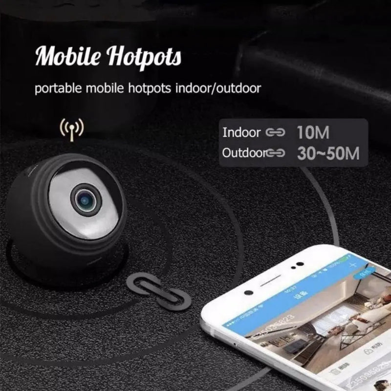 Small camera device with smartphone displaying app interface on a dark textured surface.