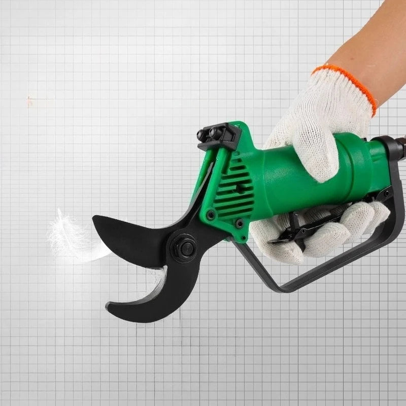 Green electric pruner being used on a grid background