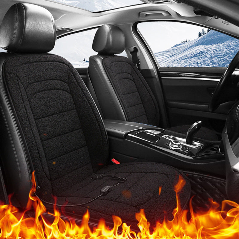 Car interior with heated black seat covers and flames at the bottom